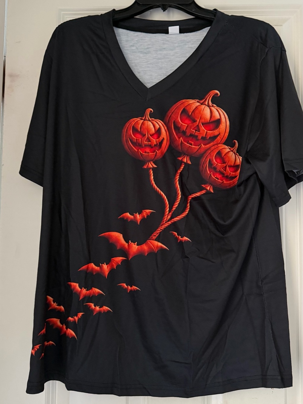 Halloween Pumpkin Balloon Tee Black & Orange It says 2xl but it fits little a XL